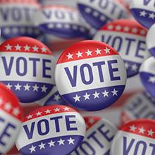 pins that say "vote"