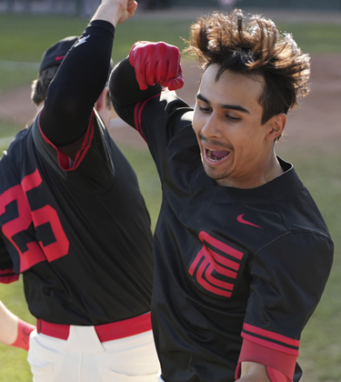 Baseball players jumping